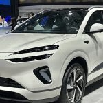 BYD Sealion 06 EV electric SUV displayed at auto show, showcasing modern EV design and automotive innovation