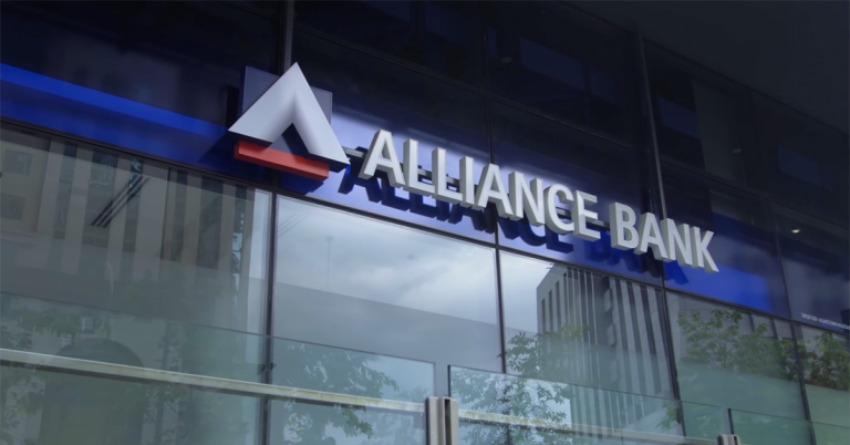 Alliance Bank branch exterior with corporate signage on modern office building in Malaysia’s financial district