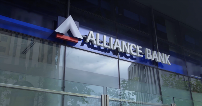 Alliance Bank branch exterior with corporate signage on modern office building in Malaysia’s financial district